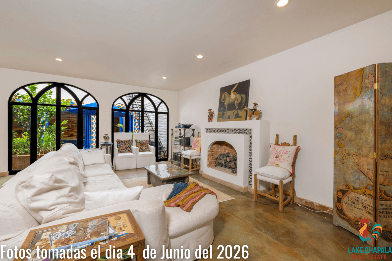 011 Den with Fireplace leading to Courtyard