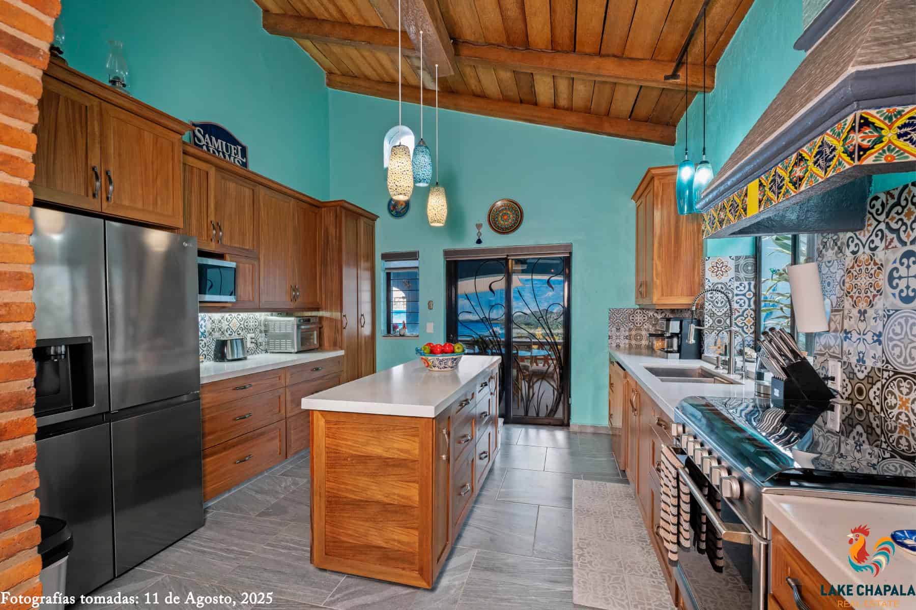 06 Kitchen flows to the South Facing Pool Lanai