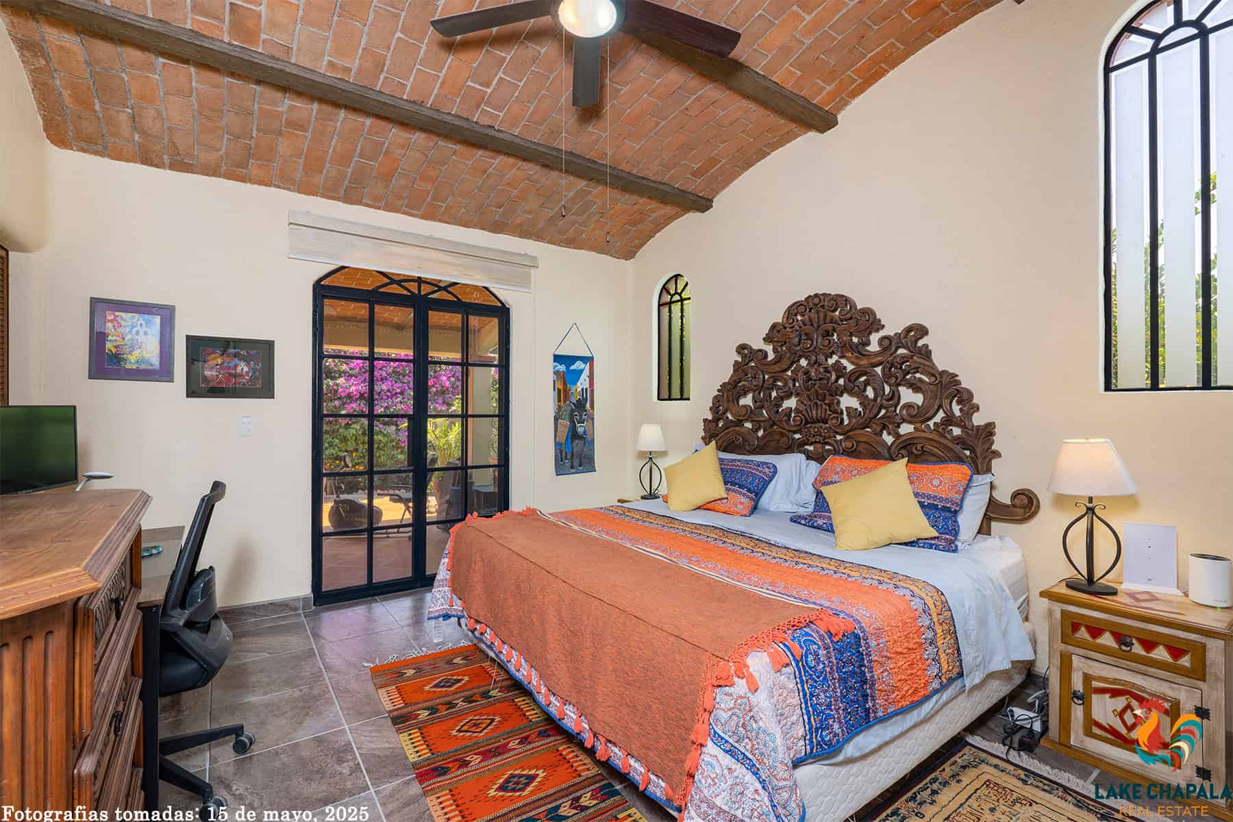 06 Guest Bedroom has Garden Terrace French Doors