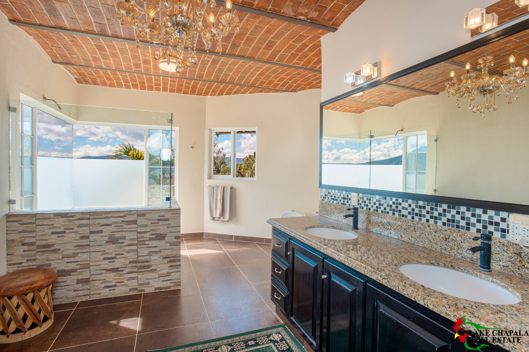 03 Master Bath with Crystal Chandelier and Lake View