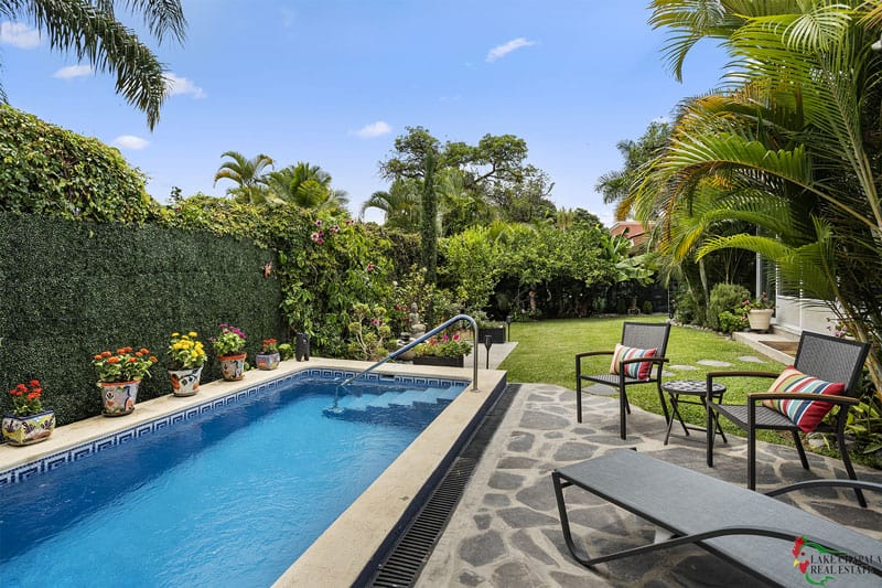 02 SOLAR HEATED POOL, LOUNGING TERRACE AND LUSH GARDENS