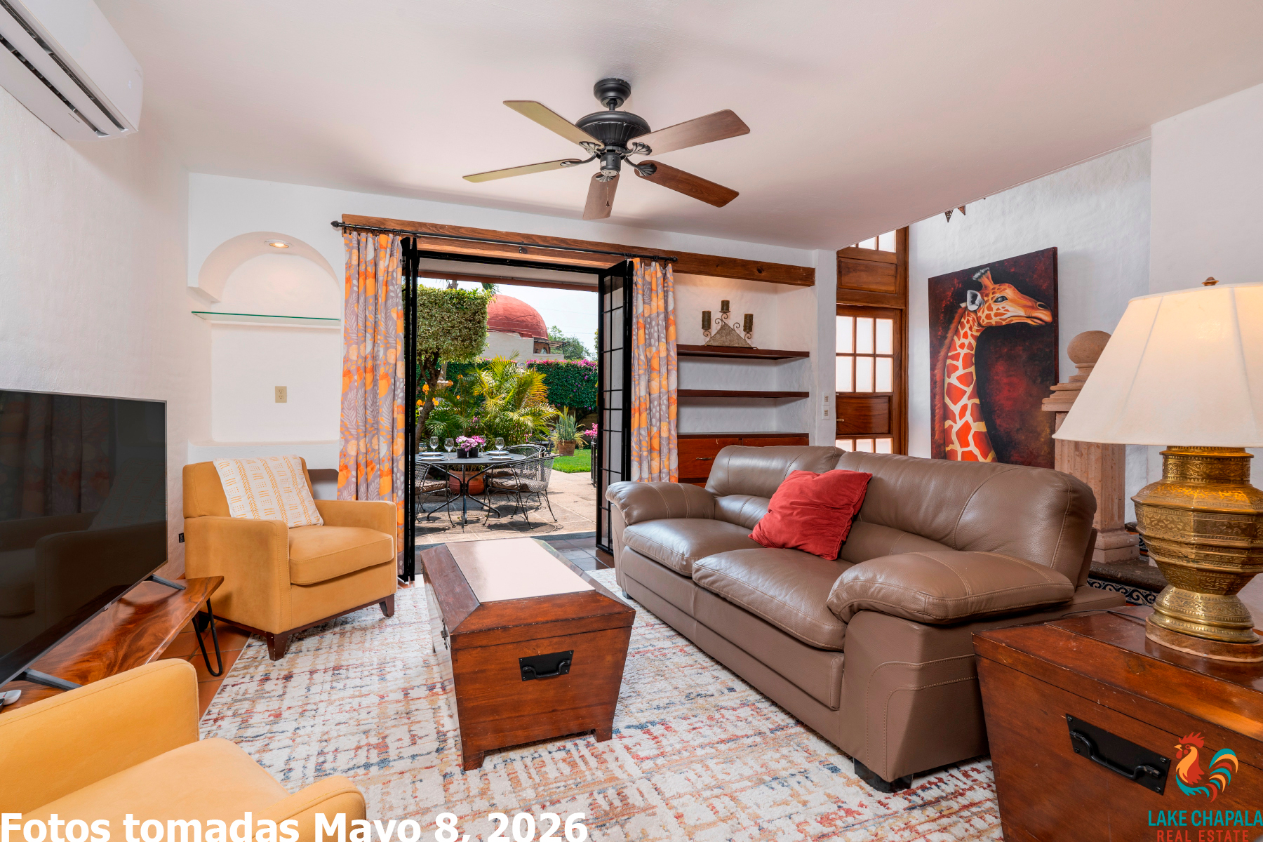 04 Livingroom Flows Thru French Doors to Entry Terrace