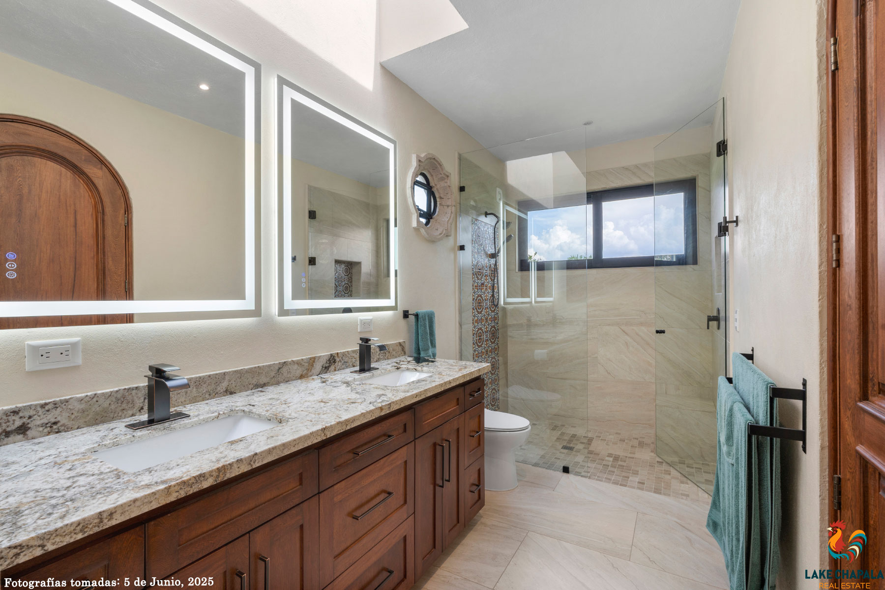 07 South Master Bath with Lake View, Twin Vanity and Skylight