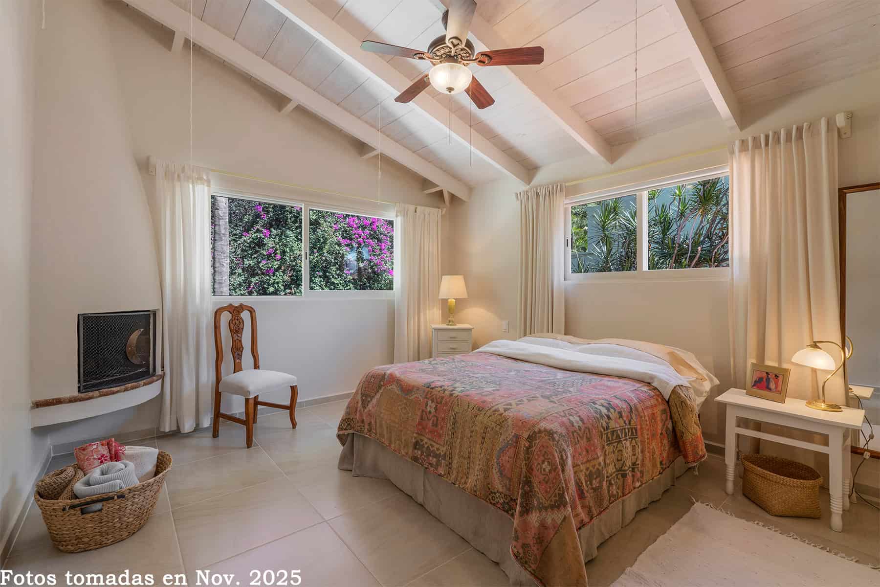 10 Second Floor West Bedroom has Soaring Ceilings and Fireplace