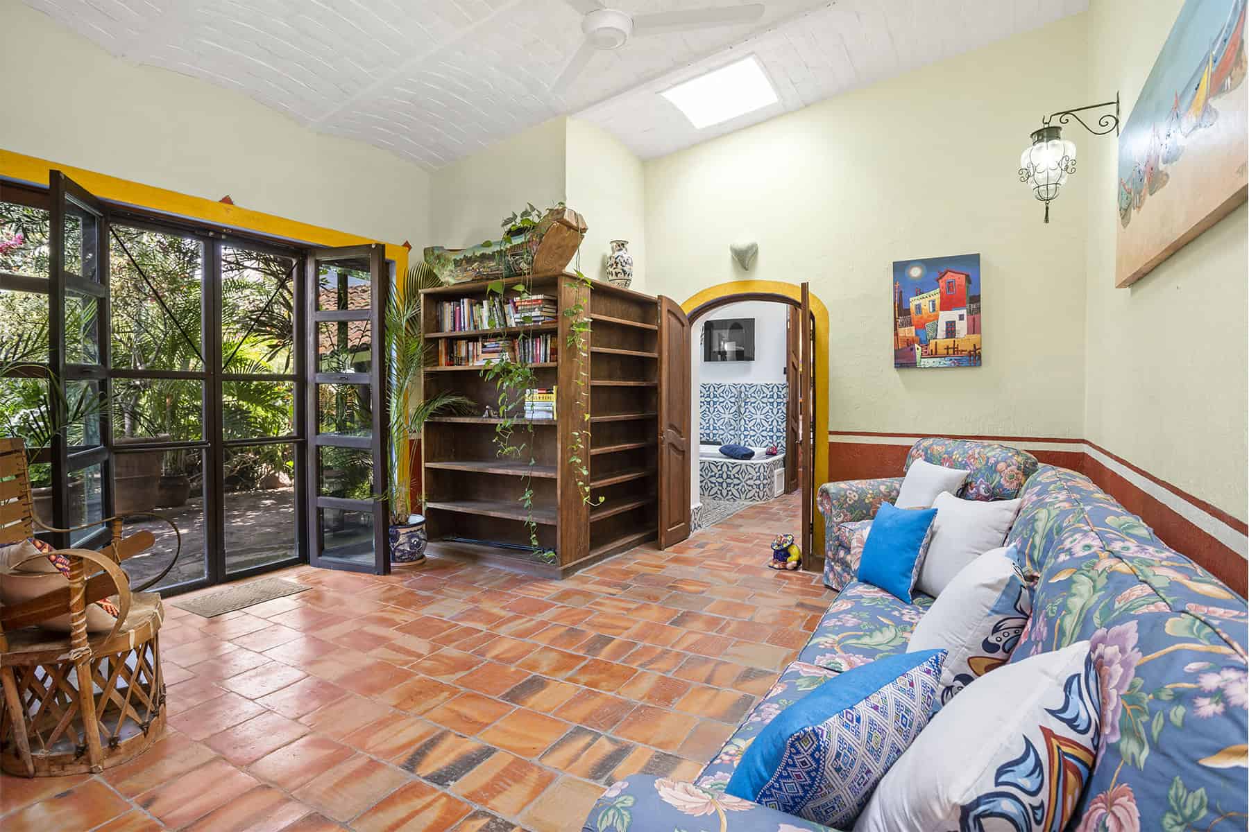 06 East Wing Flex Room (Den Library or Guest Room) Leads to Garden