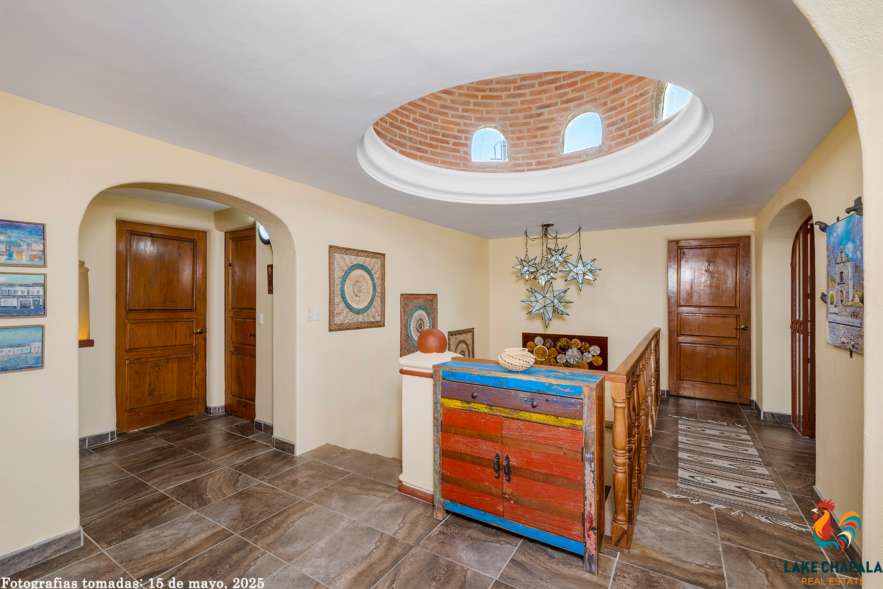 10 Foyer is Crowned with a Grand Cupola Dome and Parota Wood Banister