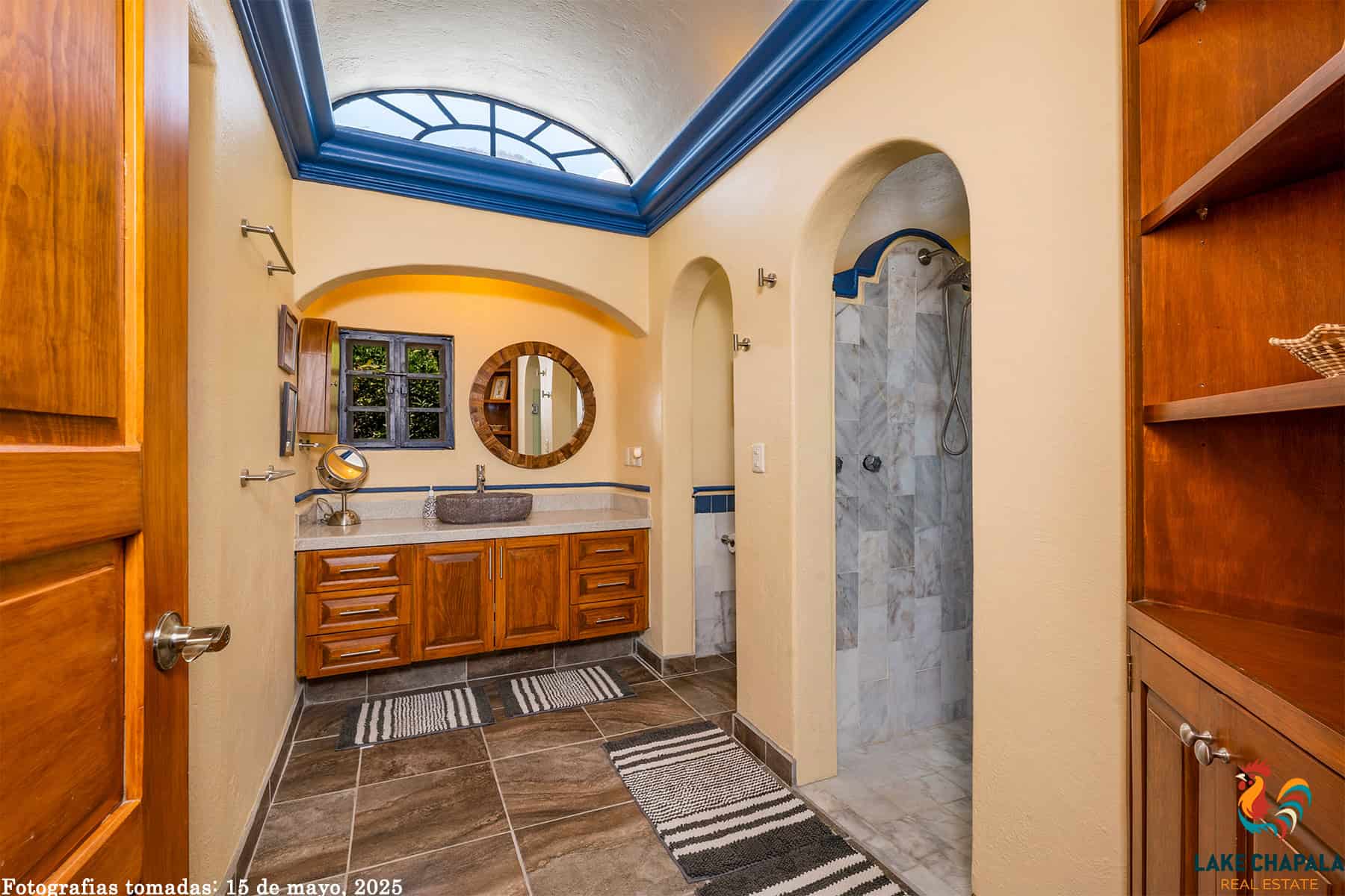 09 Master Bath has a Barrel Vault Ceiling and a Marble Clad Walk In Shower