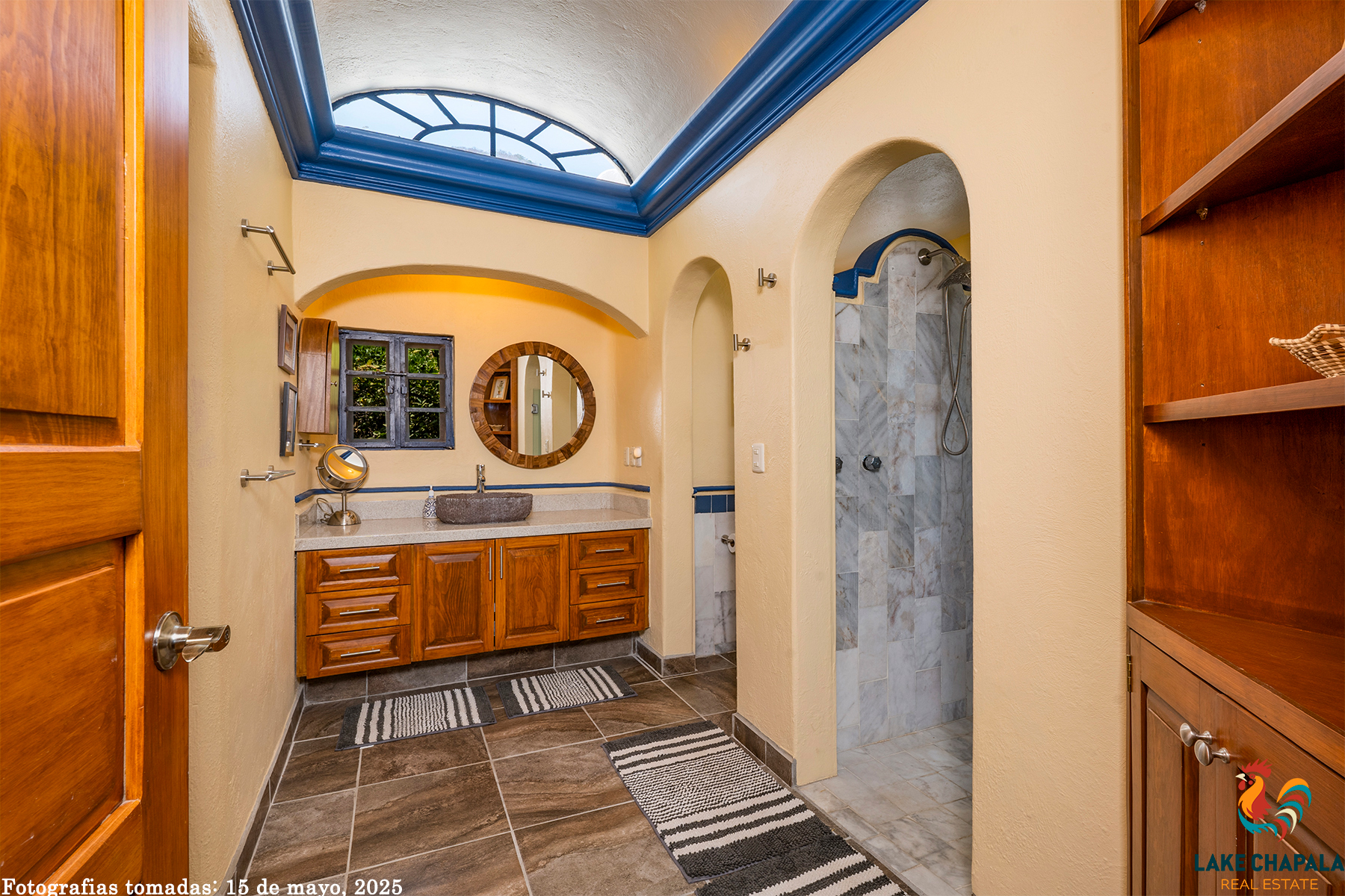 09 Master Bath has a Barrel Vault Ceiling and a Marble Clad Walk In Shower