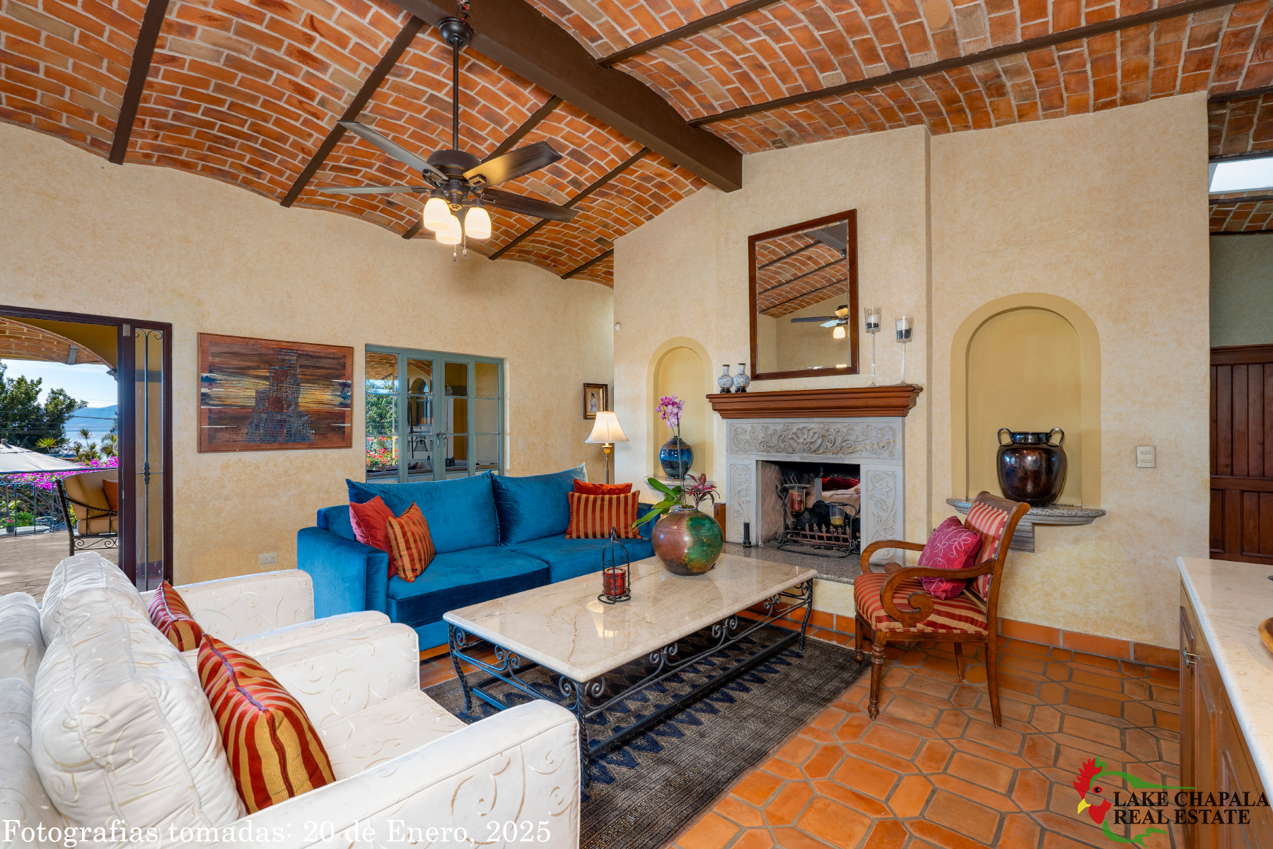 02 Living Room with Soaring Brick Ceilings, Art Niches and Double Hearth Fireplace