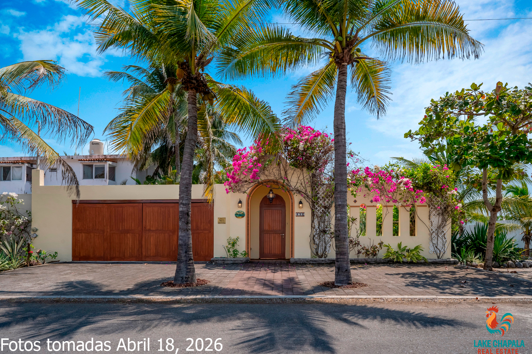 04 Charming Street Facade with Double Garage, Tropical Palms and Fuisha Bugambillia