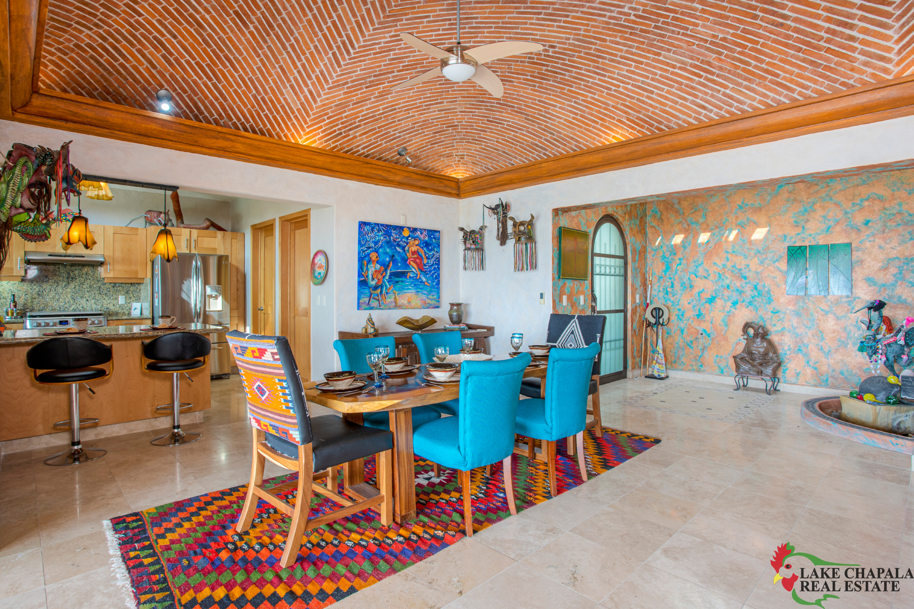 04 Dining Room with Brick Domed Ceiling opens to the Entrance Foyer, Kitchen, Living Romm and Lanai