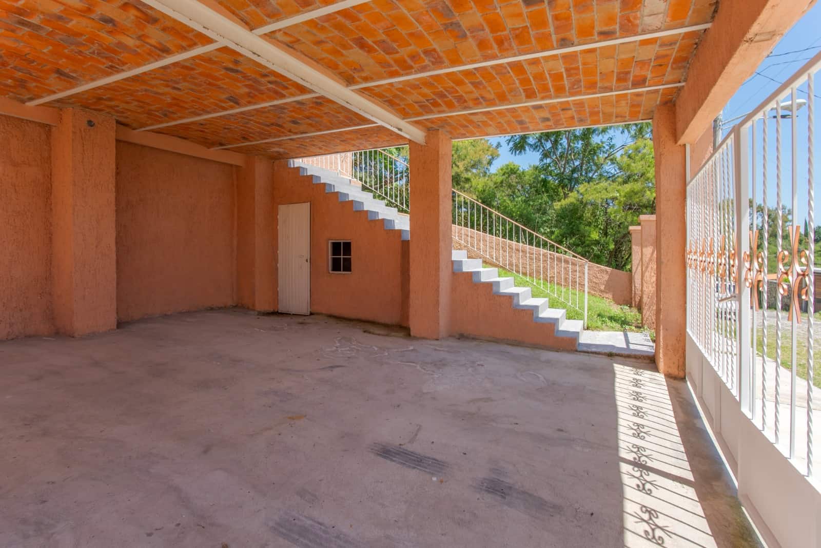 17 Spacious Carport with Storage Bodega
